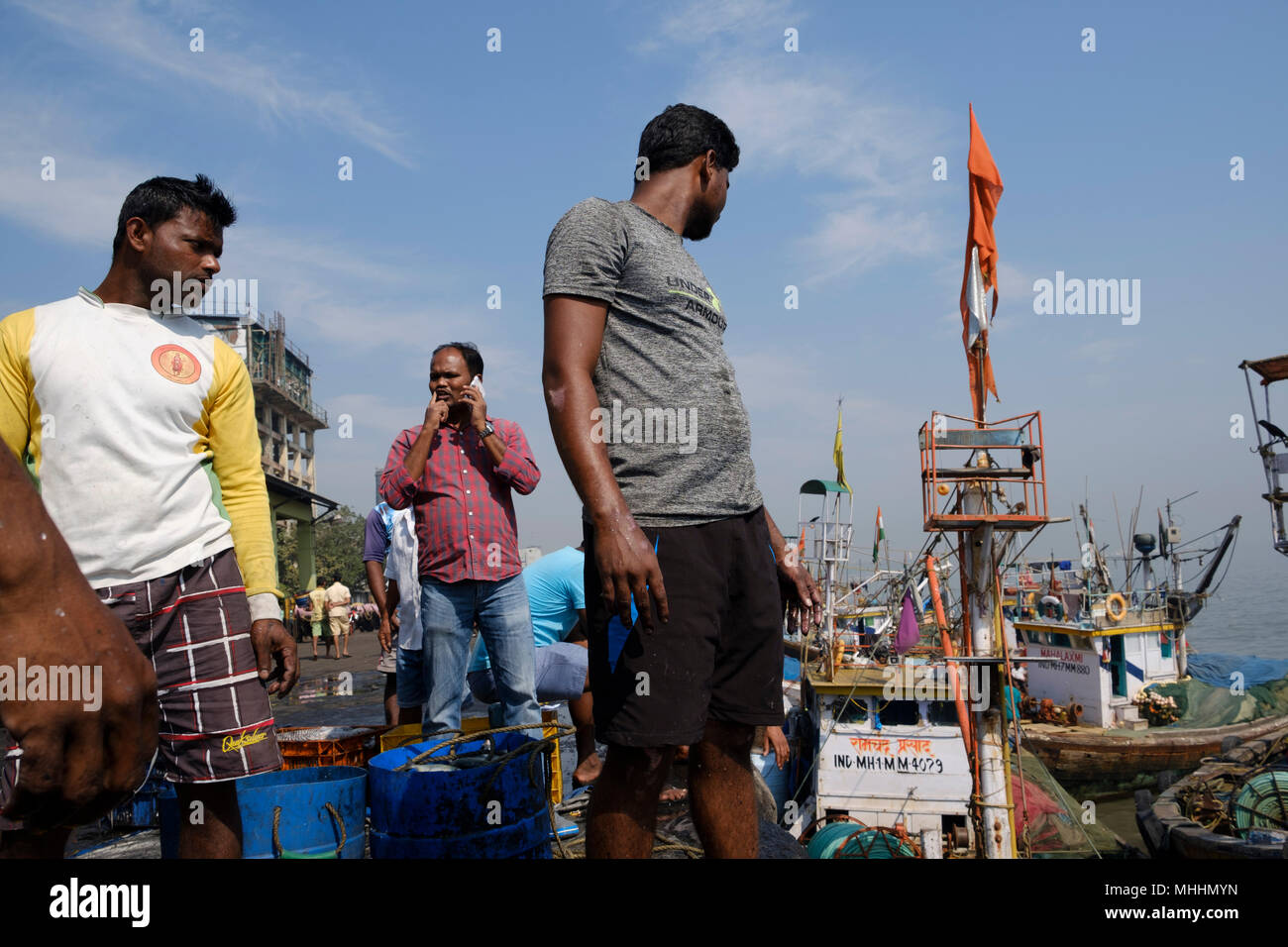 Fishermen loading and unloading their catch at Sassoon Dock, Mumbai
