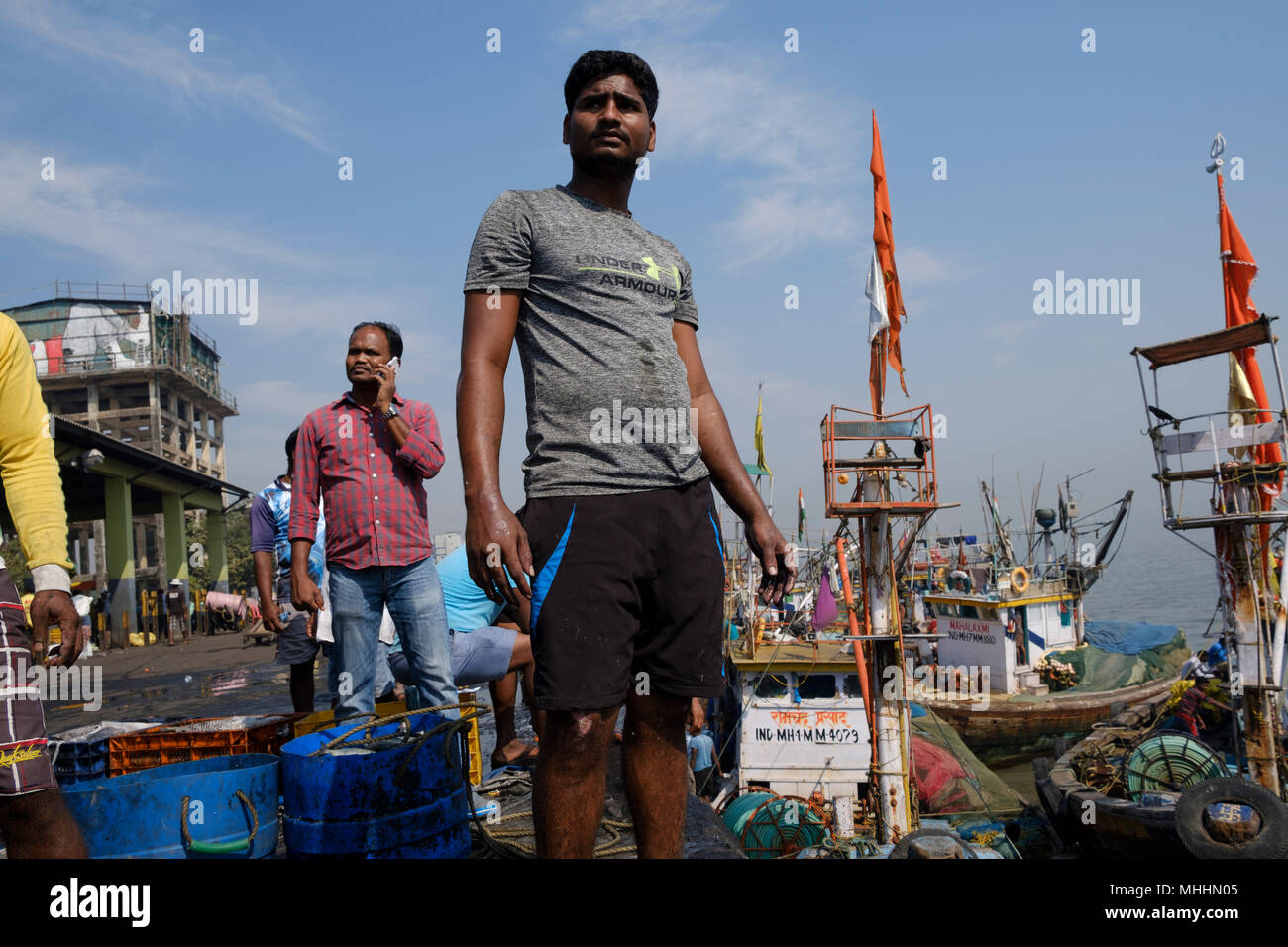 Fishermen loading and unloading their catch at Sassoon Dock, Mumbai