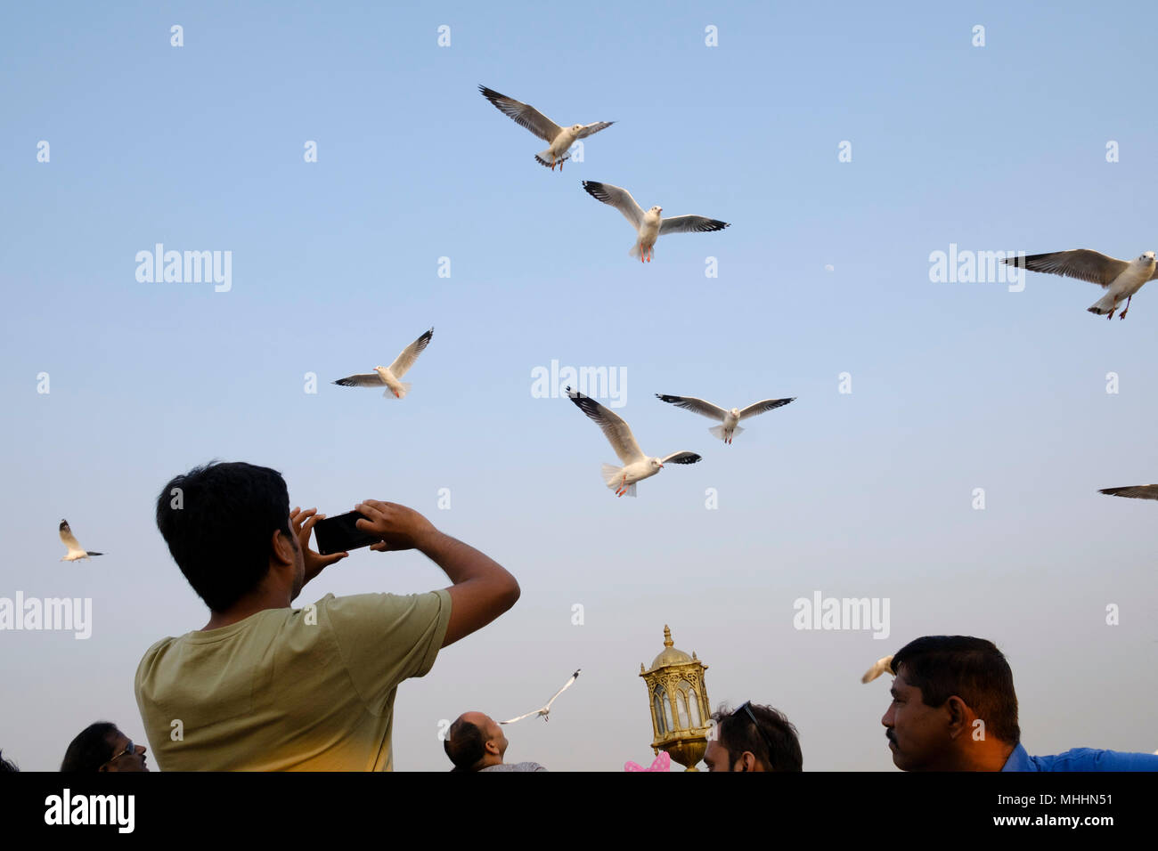 India - Mumbai - Tourist takes phot Stock Photo