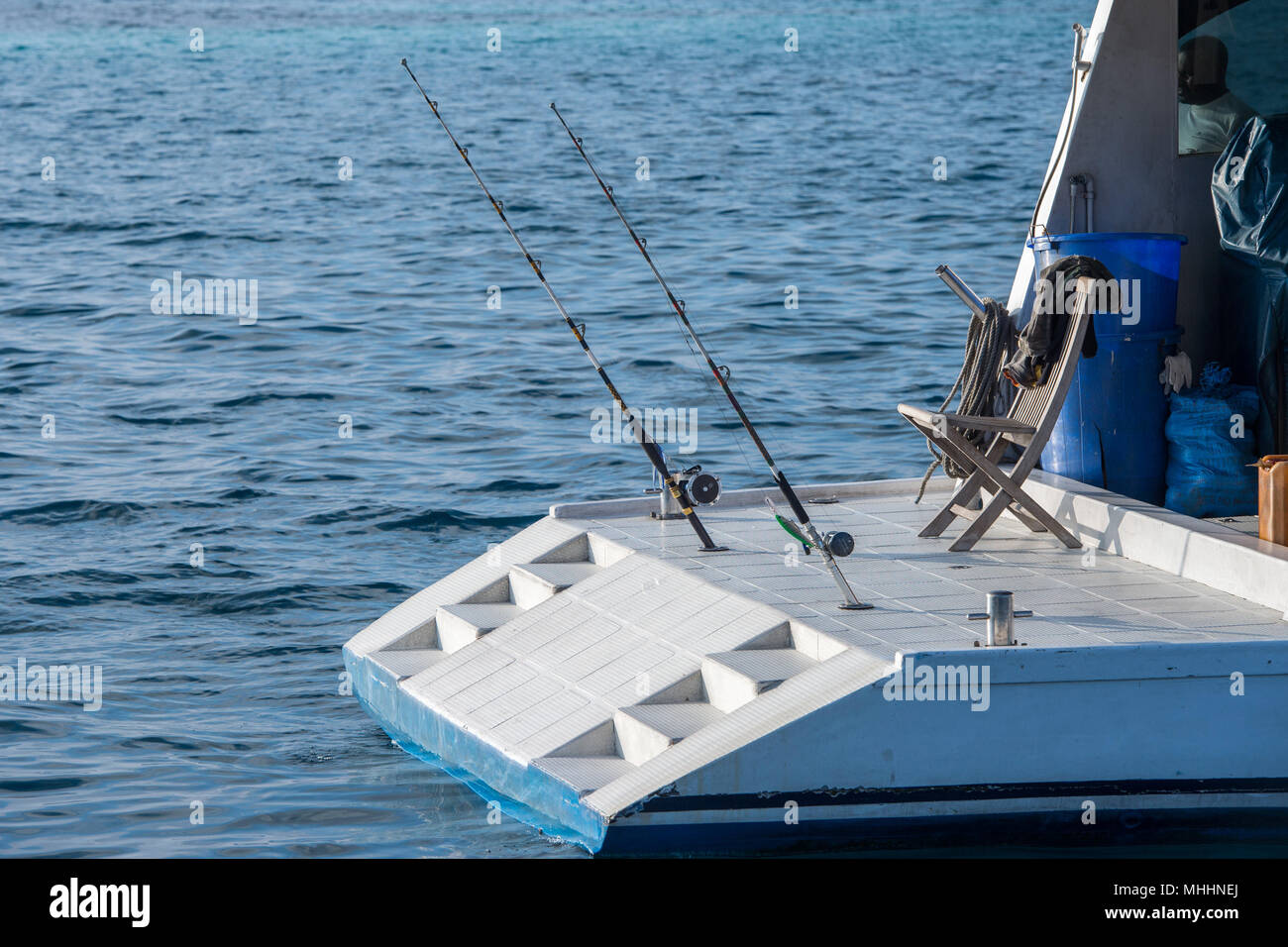 fishing rod on boat ship in maldives close up detail Stock Photo