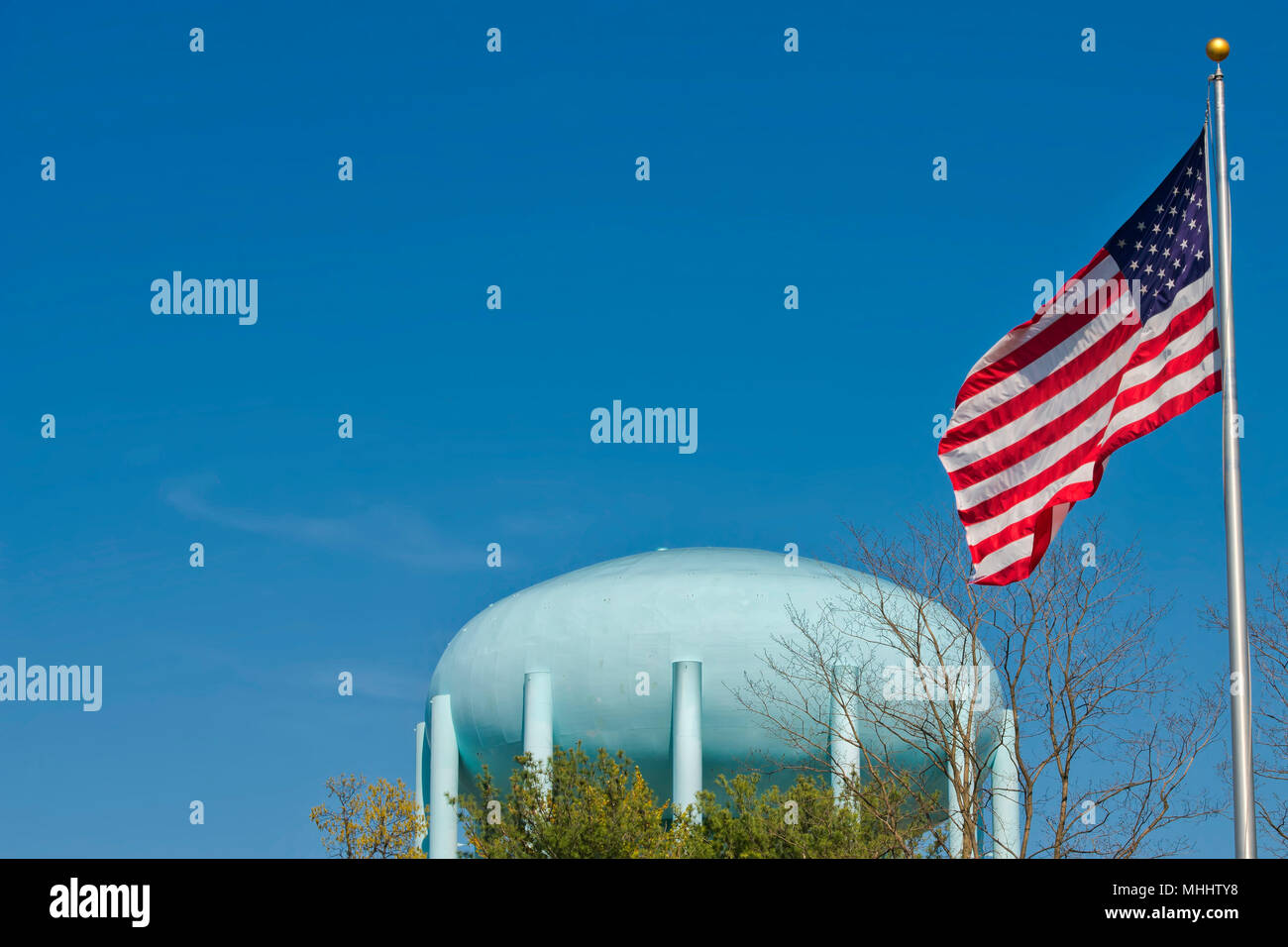 A water tower in the deep blue sky Stock Photo - Alamy