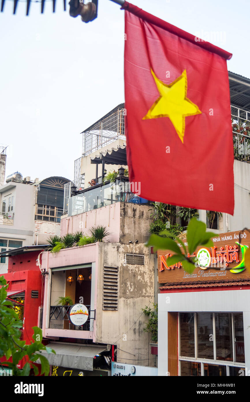 The Vietnamese flag flying over Bùi Viện Street, District 1 Ho Chi Minh ...
