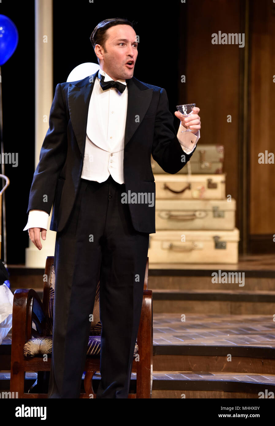 Richard Mylan (playing Morris Dixon) in a scene from Present Laughter by Noel Coward, Chichester Festival Theatre, Chichester, Sussex, United Kingdom. Stock Photo