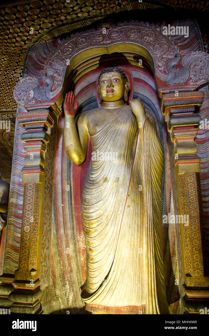 SOLD Stone Standing Garden Buddha Sculpture with Flowing Robes in Vitarka & Varada  Mudras 60