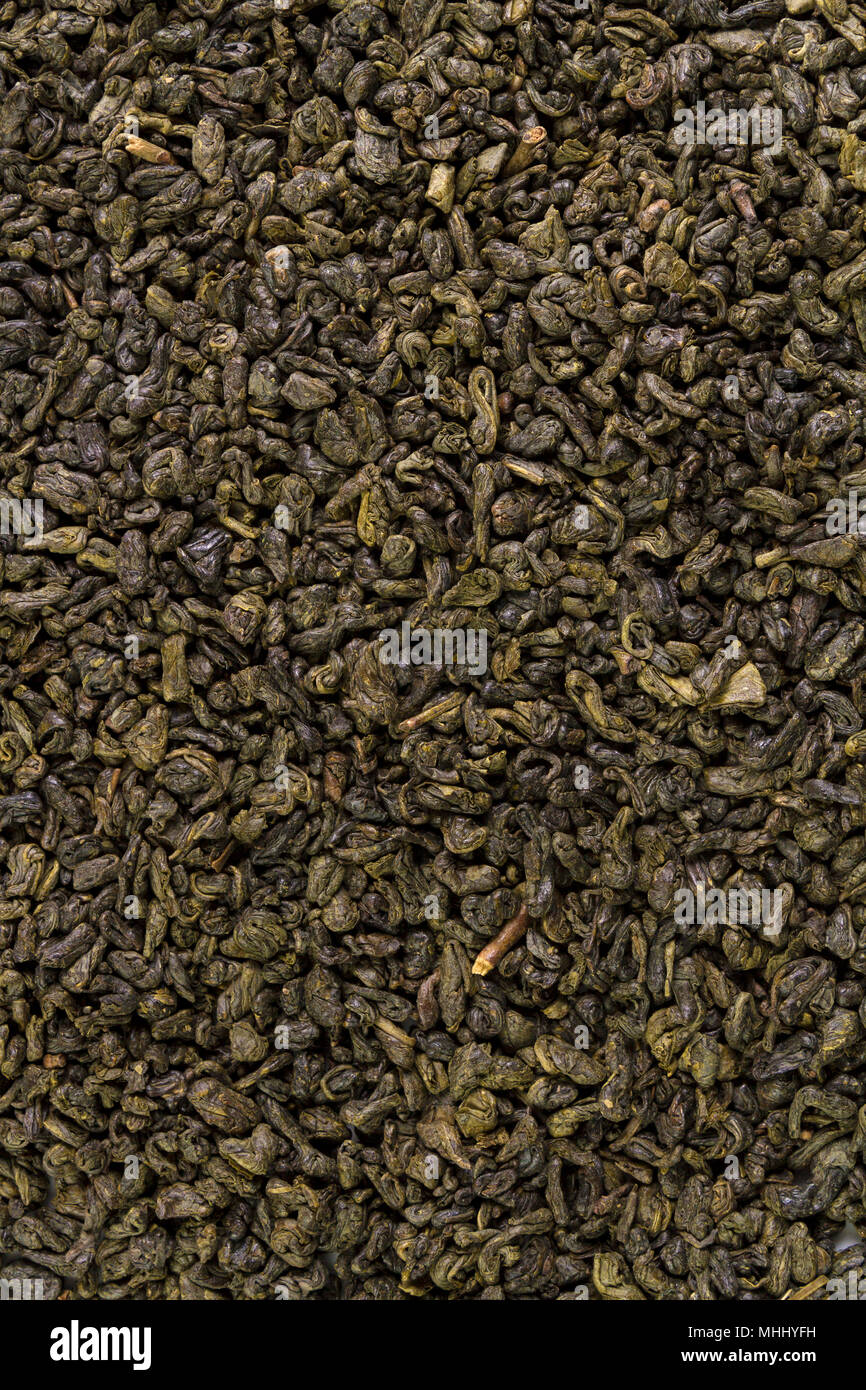 Dried leaves of green chinese gunpowder tea full frame image backgrounds Stock Photo