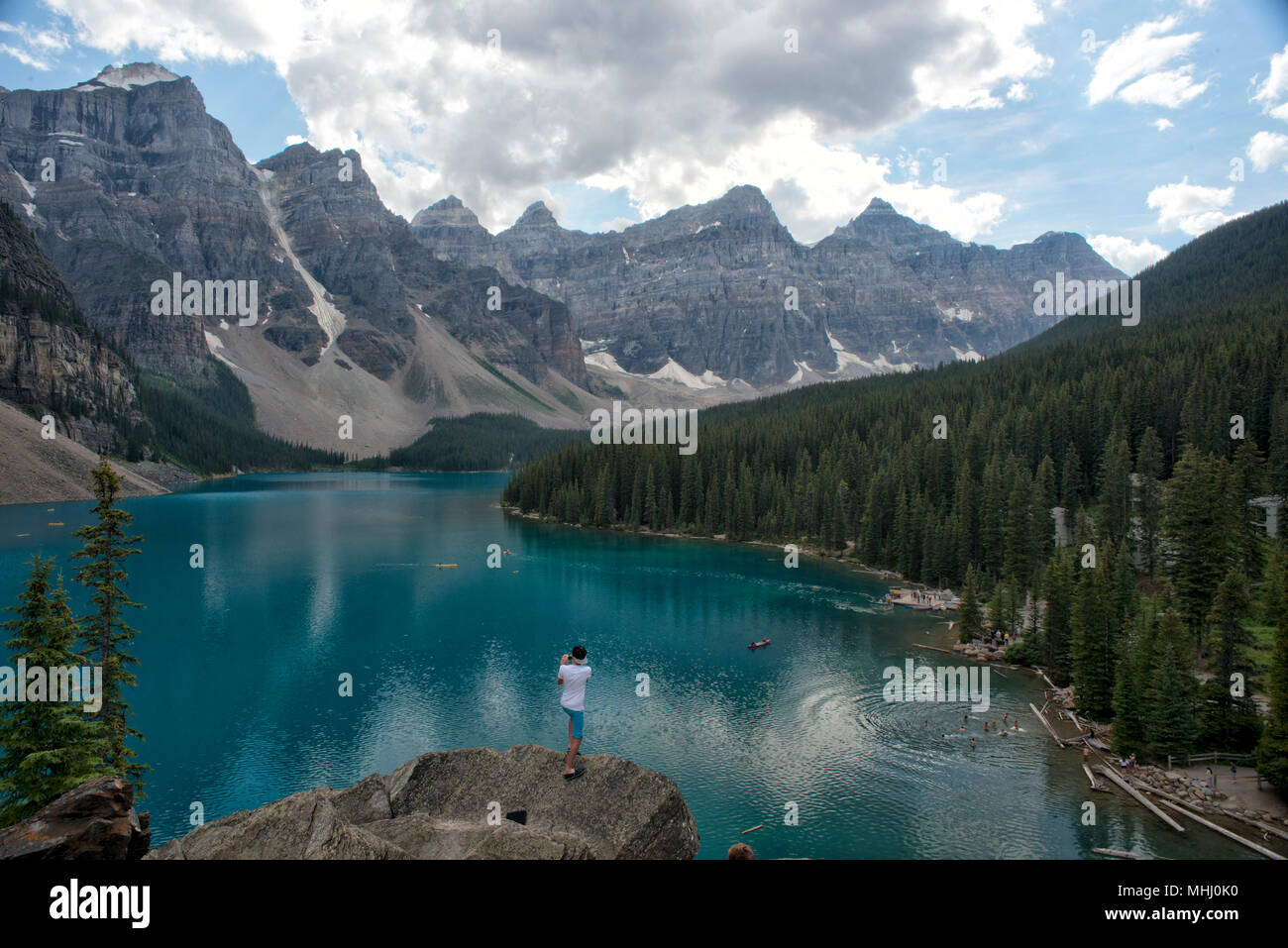 lake louise view on cloudy sky background Stock Photo - Alamy