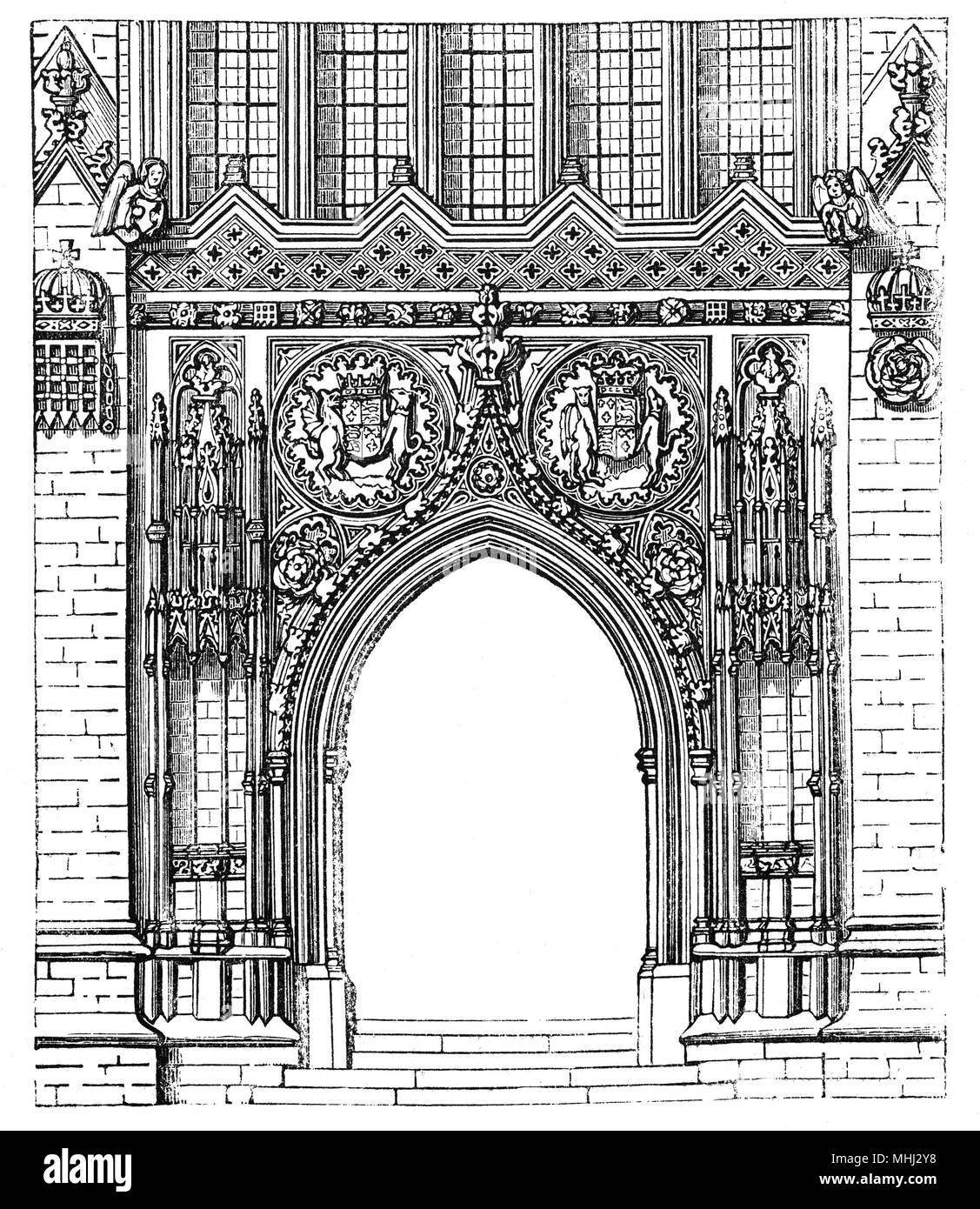 The ornate entrance to  King's College Chapel in the University of Cambridge. Considered to be one of the finest examples of late Perpendicular Gothic English architecture, it was built in phases by a succession of kings of England from 1446 to 1515, a period which spanned the Wars of the Roses. The chapel's large stained glass windows were not completed until 1531, and its early Renaissance rood screen was erected in 1532–36. The chapel is an active house of worship, and home of the King's College Choir. Stock Photo