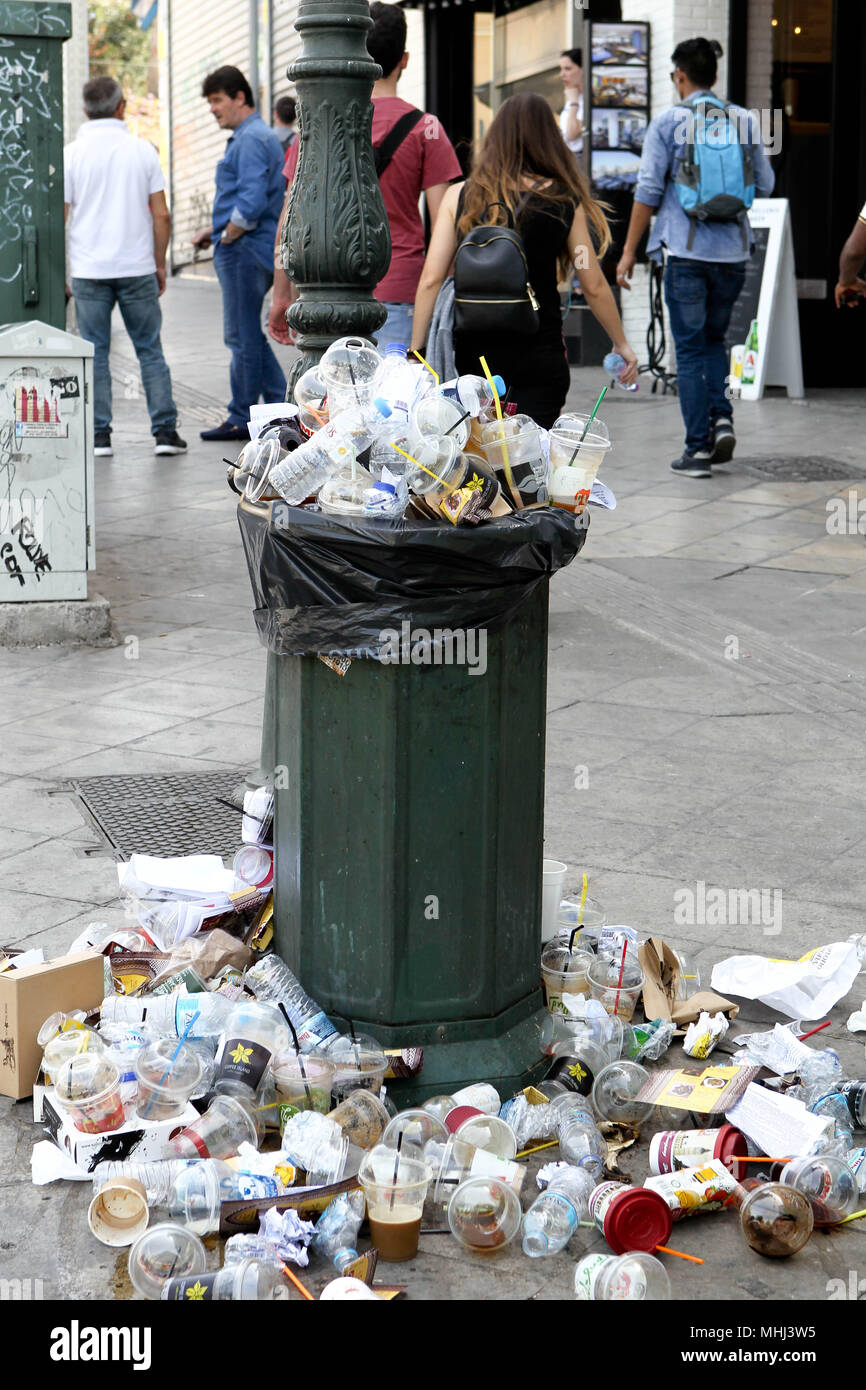 Garbage can overflowing plastic bottles hires stock photography and