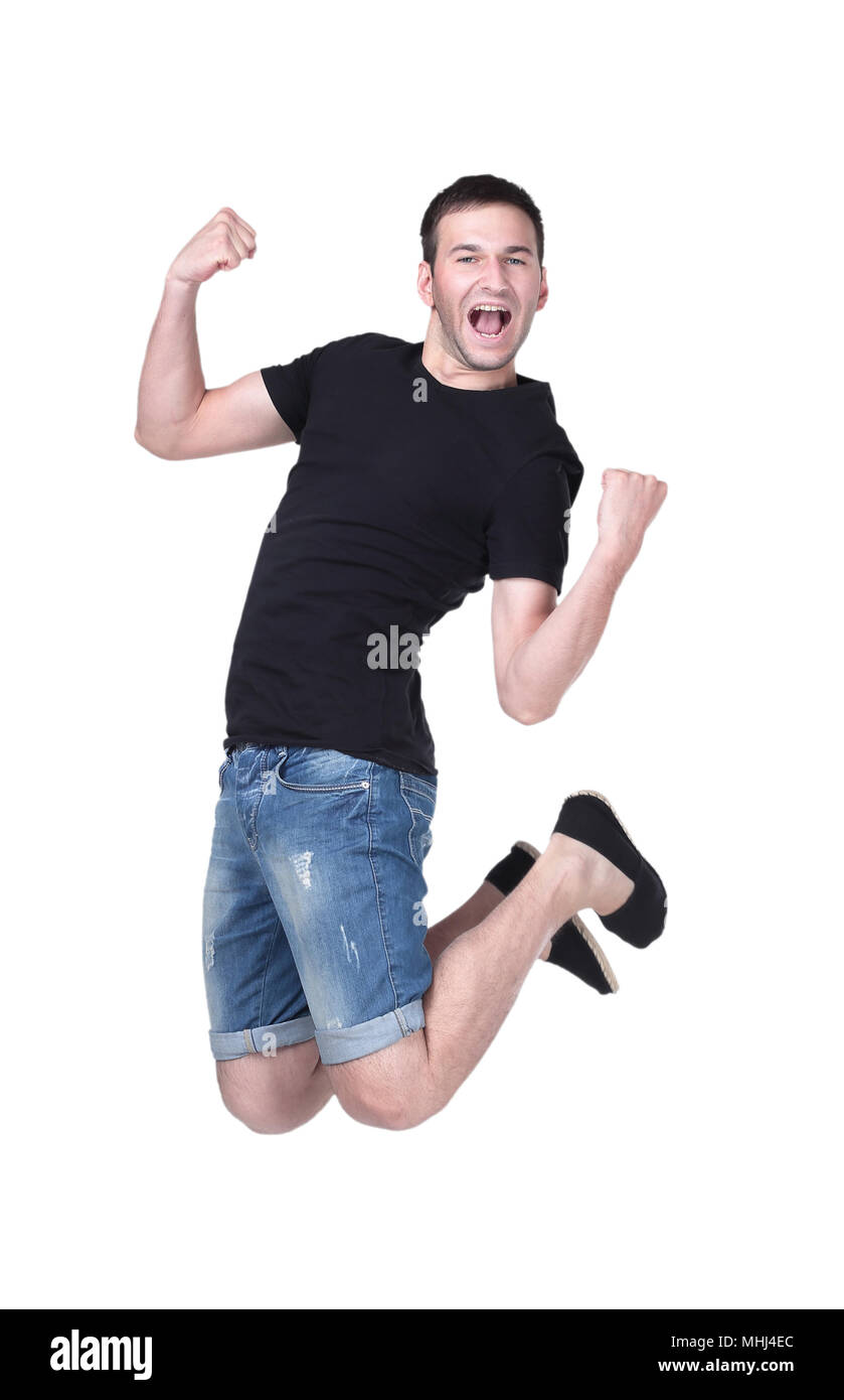 Funny cheerful happy man jumping in air over white background Stock Photo -  Alamy