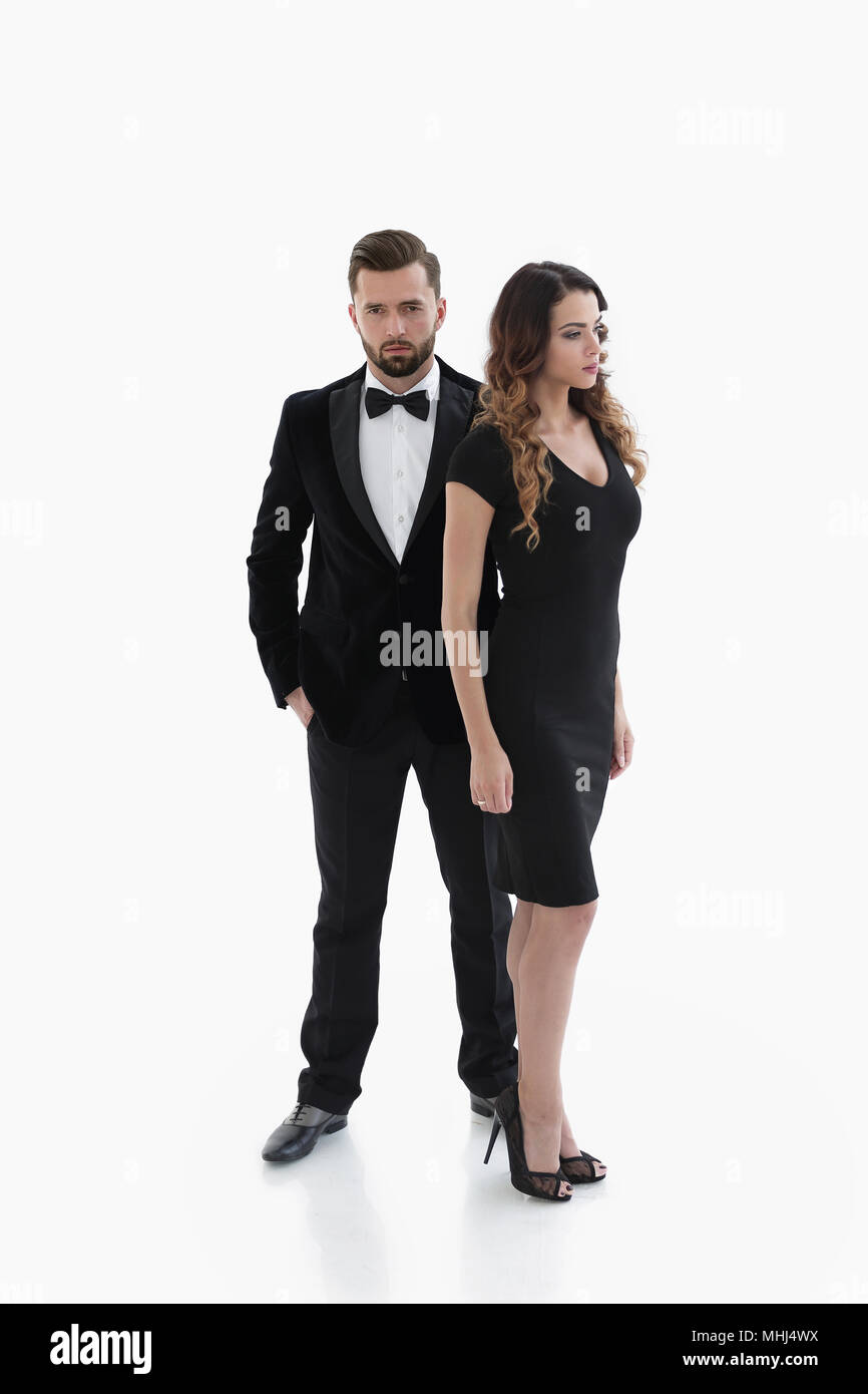 pair of men and women posing for the camera in a studio Stock Photo