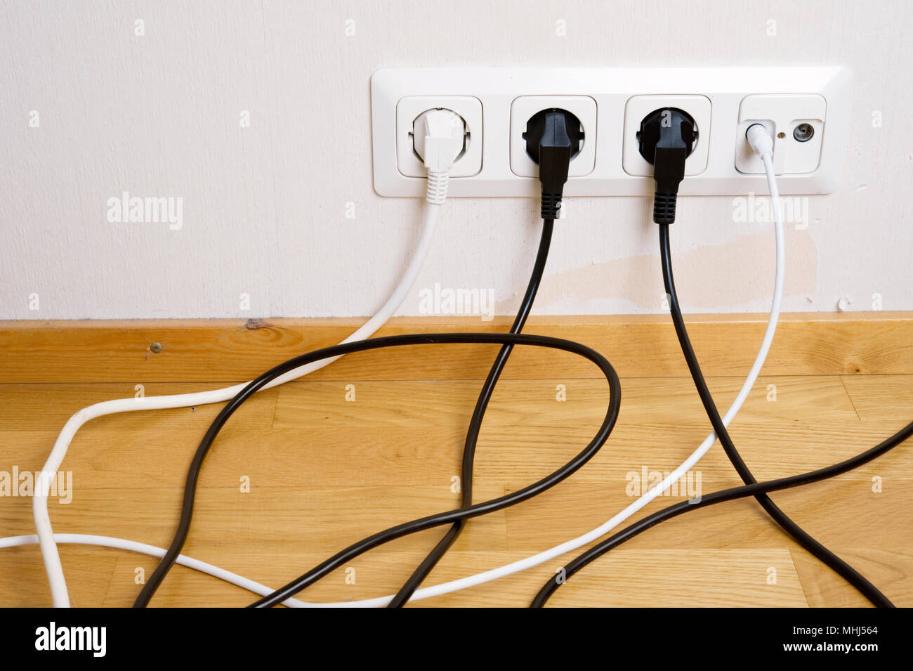 Electric and aerial outlet sockets, electric plugs and cables. Stock Photo