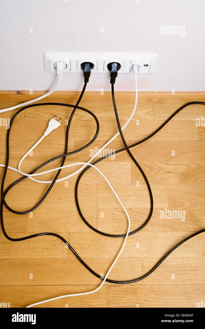 Electric and aerial outlet sockets, electric plugs and cables. Stock Photo