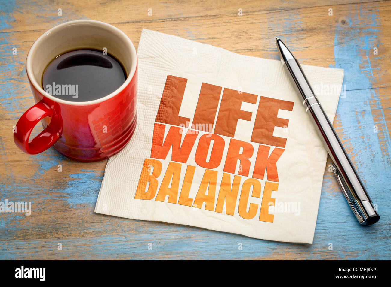 life work balance concept - word abstract on a napkin with a cup of ...