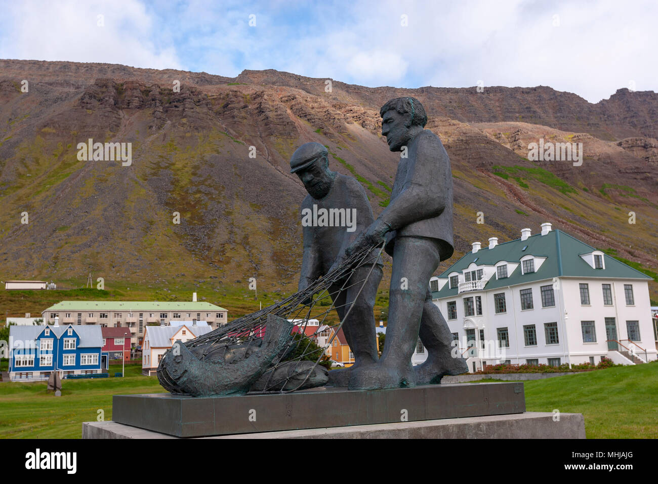 Two fishermen monument sculpture, by the sculptor Ragnar Kjartansson , in Isafjordhur town in the northwest of Iceland. Stock Photo