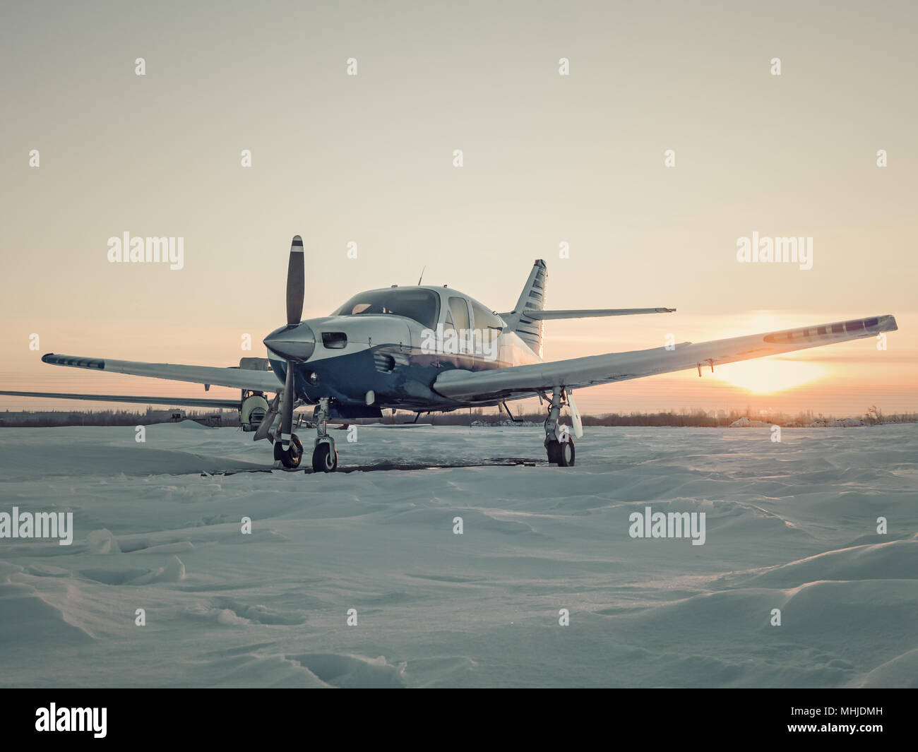 Airplanes parked at a small airport. Light aircraft on a private ...