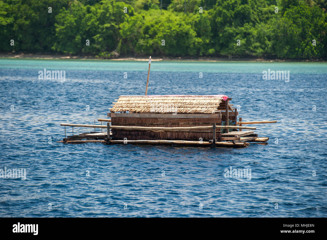 fishing platform in the middle of the sea in indonesia Stock Photo
