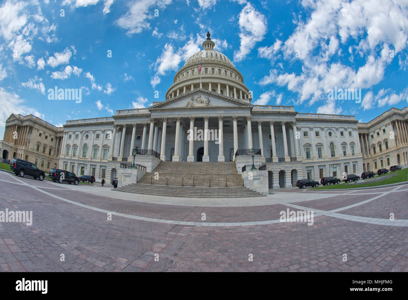 Washington DC Capitol dome detail with waving american flag Stock Photo ...