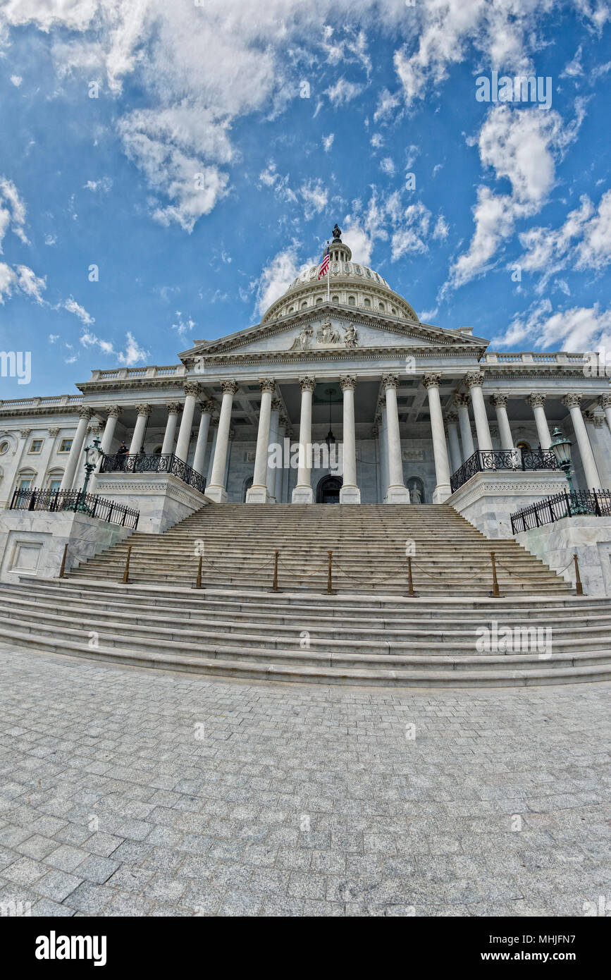 Washington DC Capitol dome detail with waving american flag Stock Photo ...