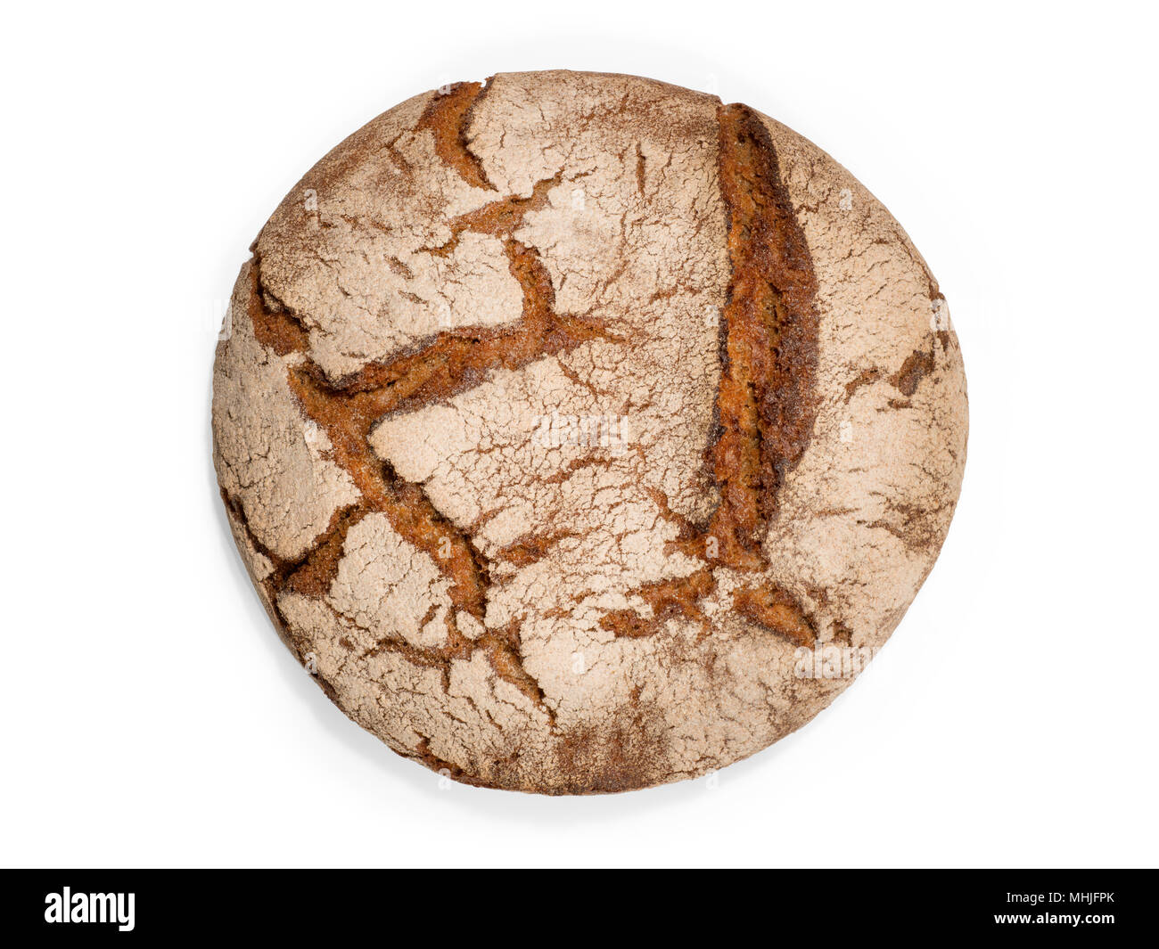 Round freshly baked rustic rye round bread. Top view isolated on white