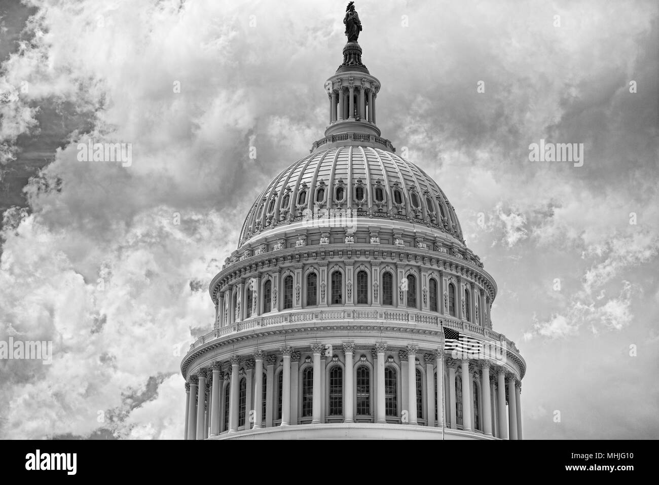 Washington DC Capitol dome detail with waving american flag Stock Photo ...