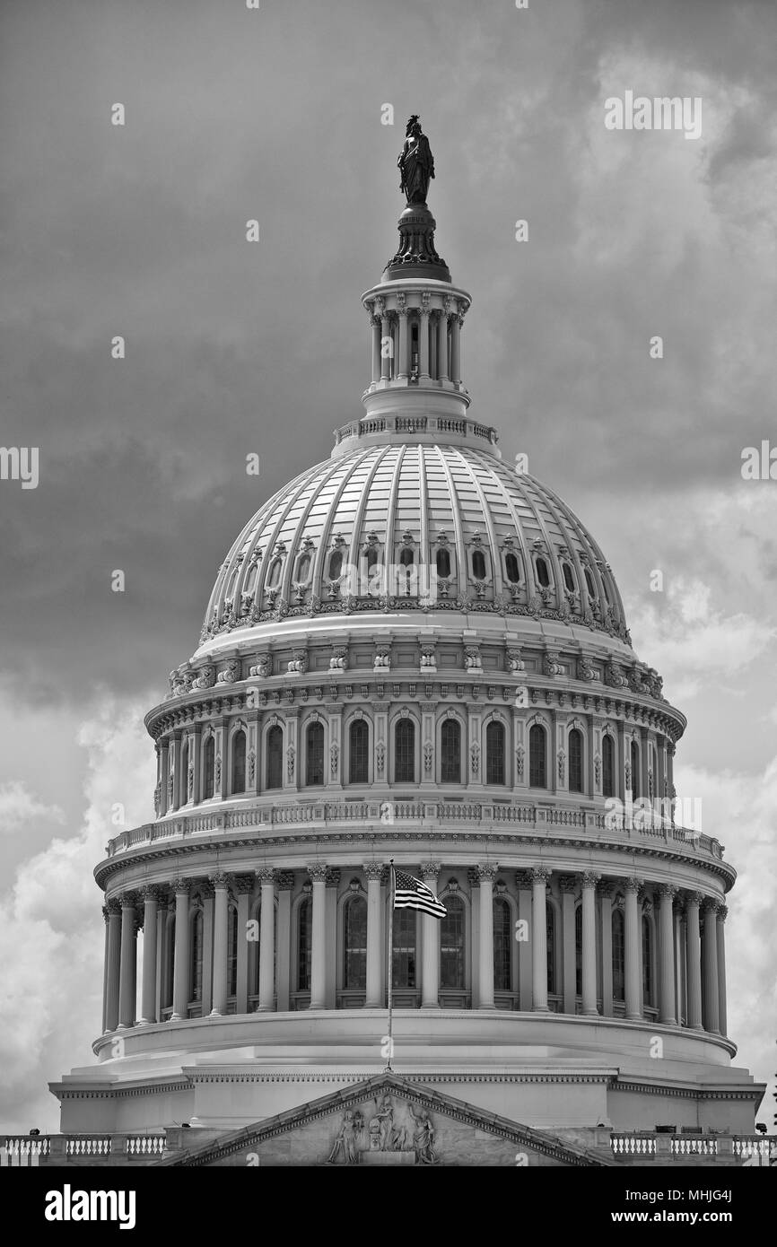Washington DC Capitol dome detail with waving american flag Stock Photo ...