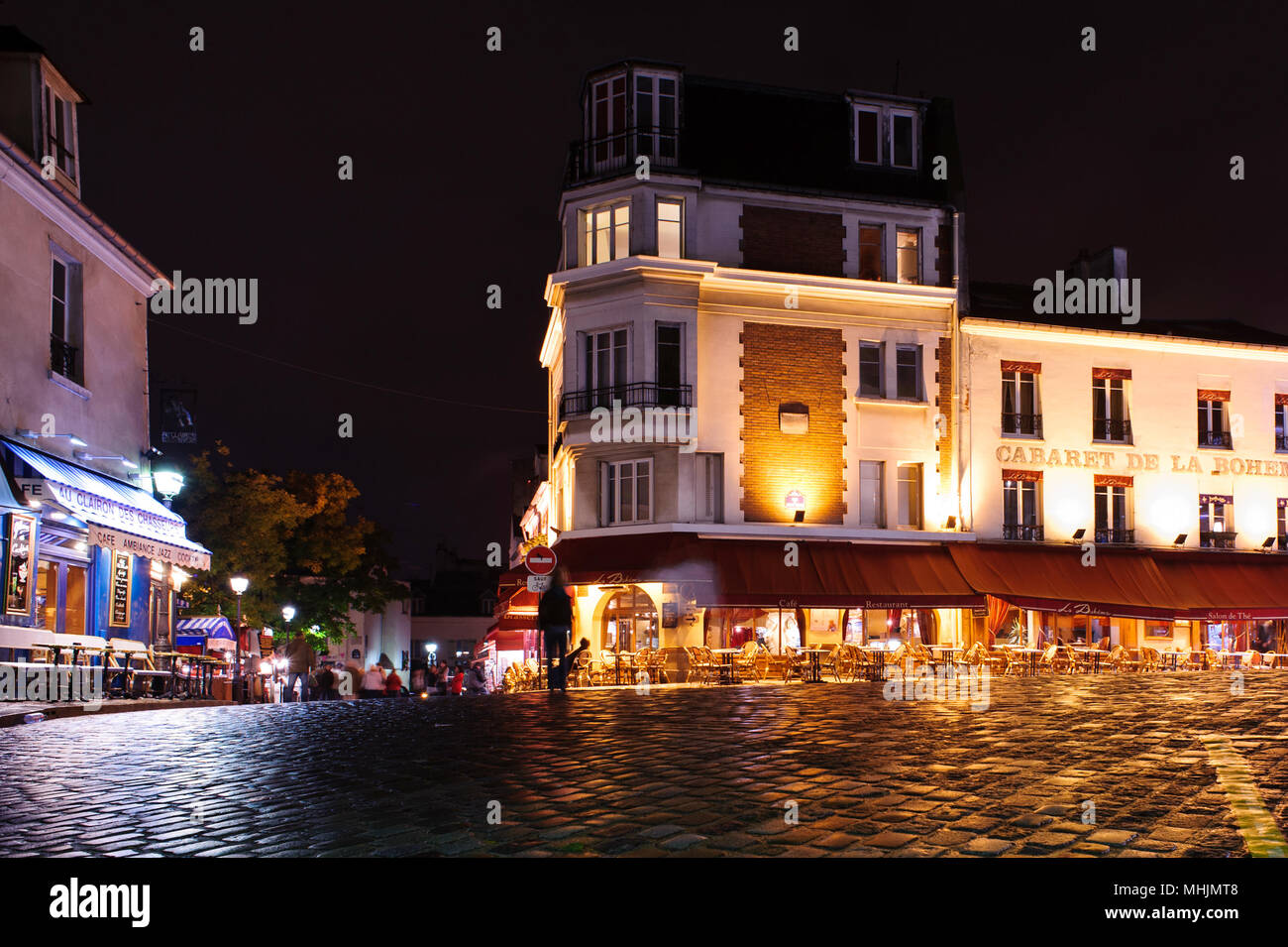PARIS, FRANCE - 12th of OCTOBER 2012: Cafe on square in Montmartre by night. October 12th, 2012. Paris, France. Stock Photo