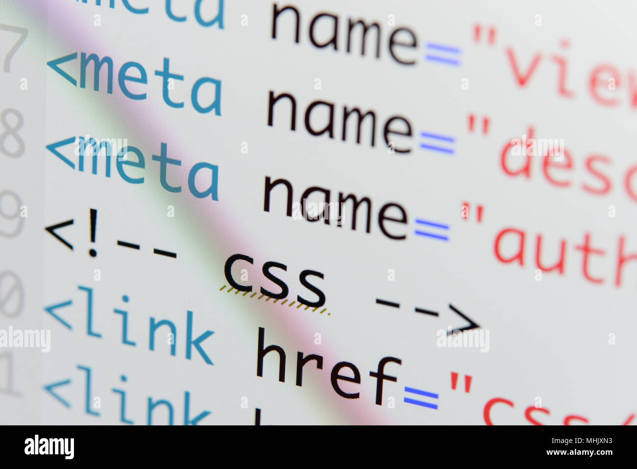 Real Html code developing screen. Programing workflow abstract algorithm concept. Lines of Html code visible. Stock Photo