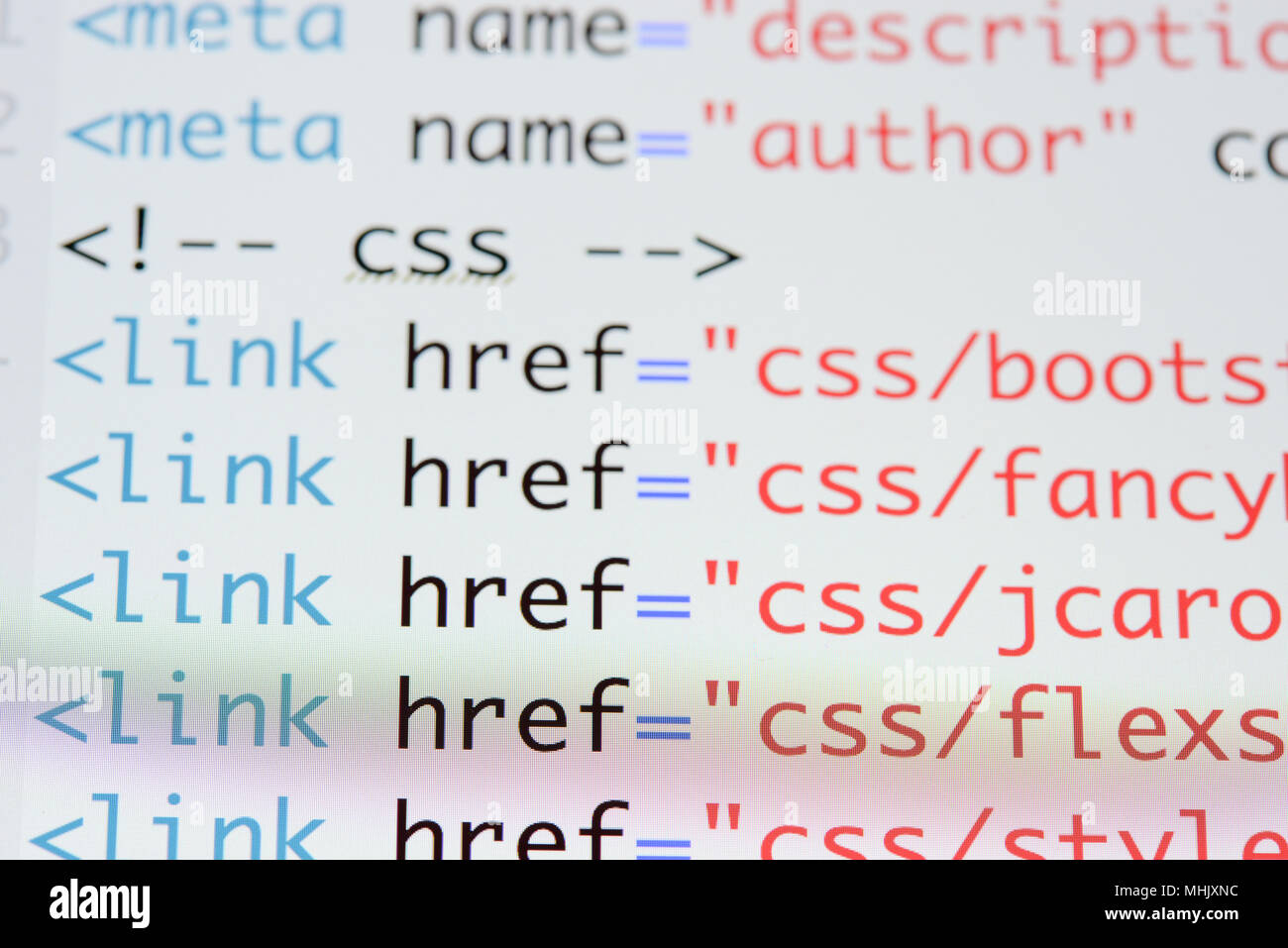 Real Html code developing screen. Programing workflow abstract algorithm concept. Lines of Html code visible. Stock Photo