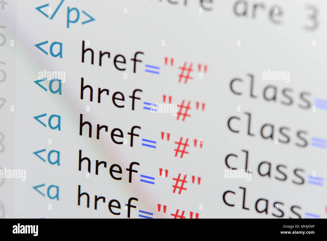 Real Html code developing screen. Programing workflow abstract algorithm concept. Lines of Html code visible. Stock Photo