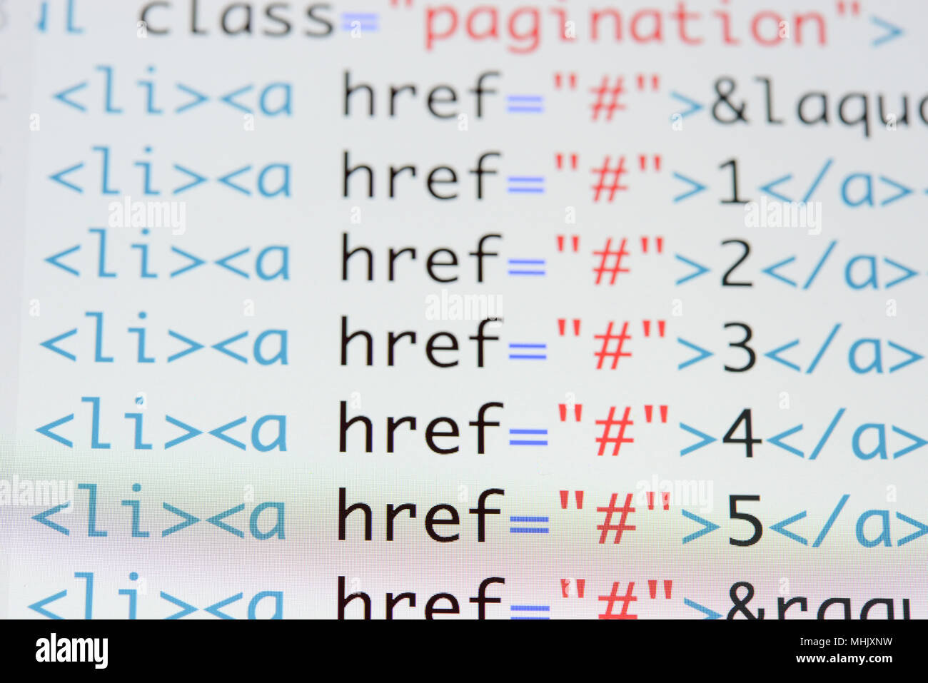Real Html code developing screen. Programing workflow abstract algorithm concept. Lines of Html code visible. Stock Photo