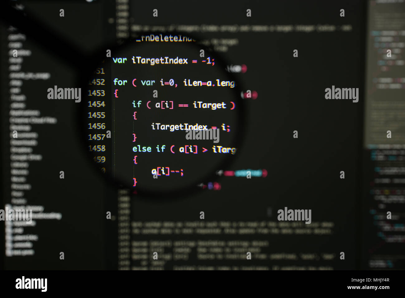 Real Java Script code developing screen. Programing workflow abstract algorithm concept. Closeup of Java Script and HTML code. Stock Photo