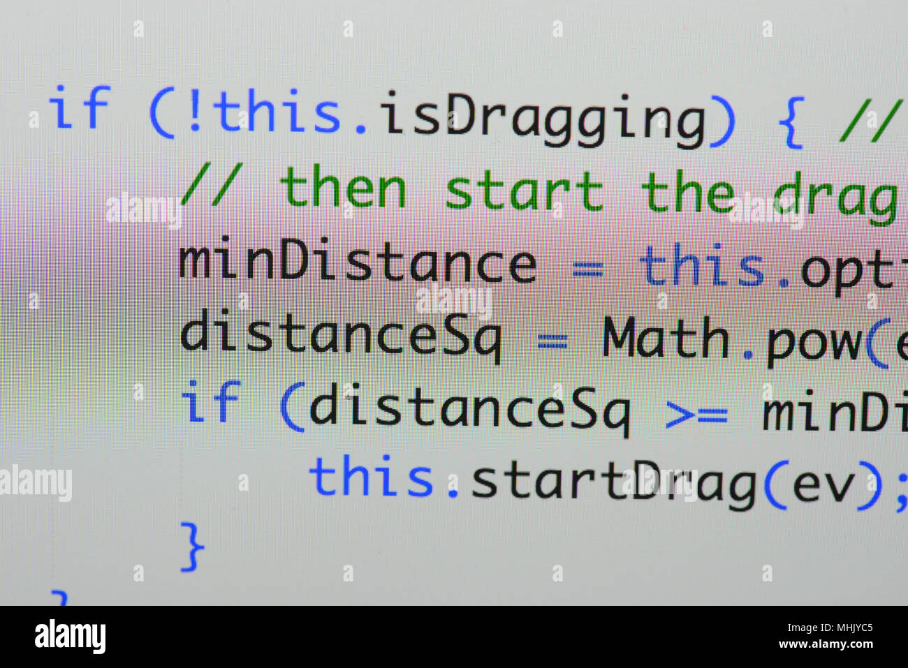 Real Java Script code developing screen. Programing workflow abstract algorithm concept. Closeup of Java Script and HTML code. Stock Photo