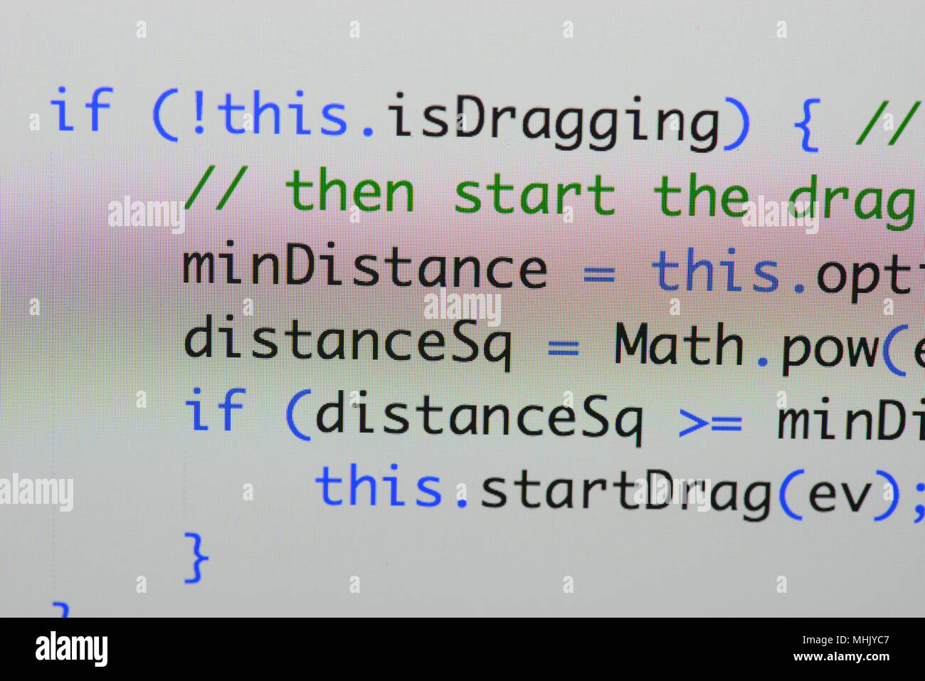 Real Java Script code developing screen. Programing workflow abstract algorithm concept. Closeup of Java Script and HTML code. Stock Photo