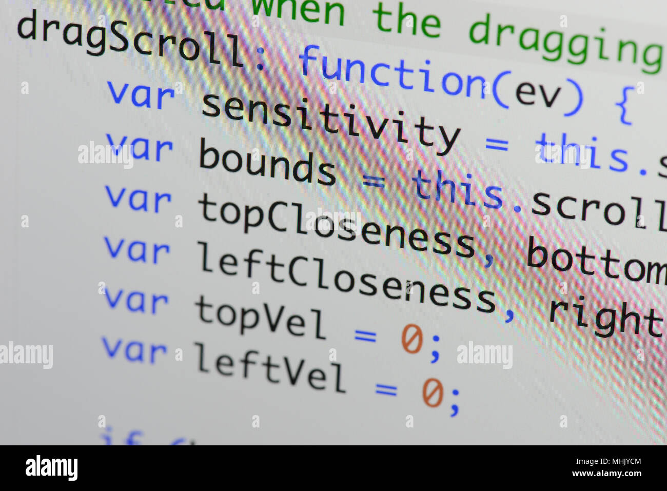 Real Java Script code developing screen. Programing workflow abstract algorithm concept. Closeup of Java Script and HTML code. Stock Photo