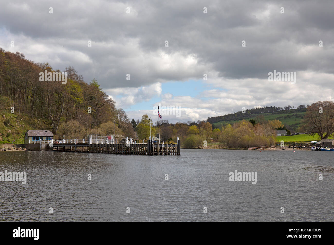 The jetty, or Pier, at Pooley Bridge on Ullswater, one of the lakes in the Lake District National Park in England. Ullswater steamers stop here. Stock Photo