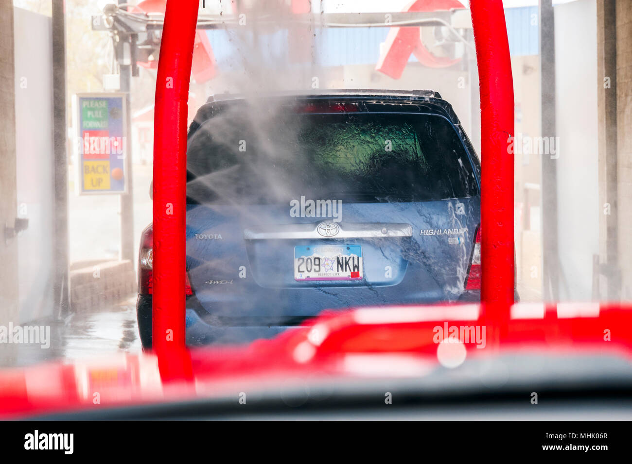 View through auto windshield; automobile in automated car wash Stock Photo