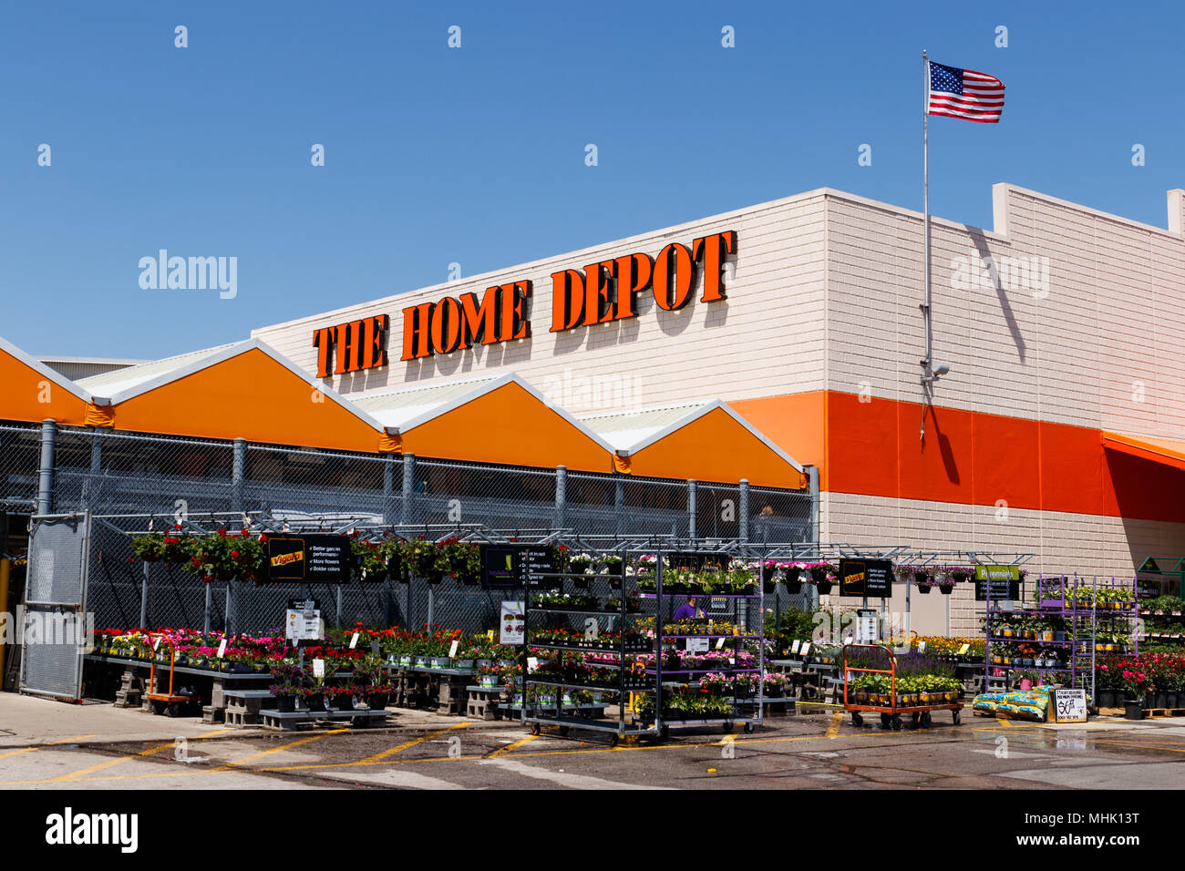 Indianapolis - Circa May 2018: Home Depot Location flying the American flag. Home Depot is the Largest Home Improvement Retailer in the US I Stock Photo