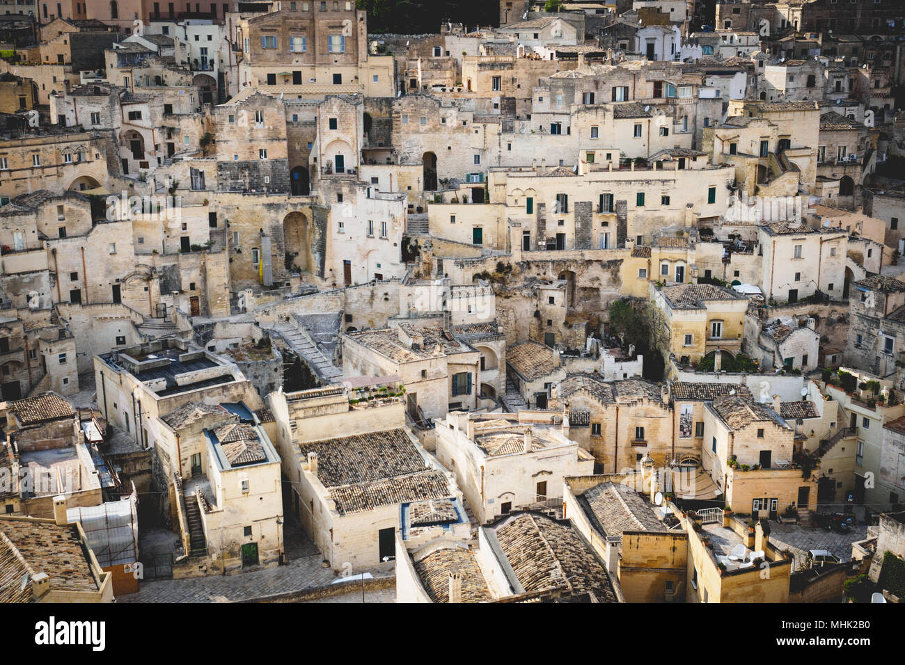 Matera (Italy), September 2017. Panoramic view of the Sasso Barisano from the Square of the Cathedral. Landscape format. Stock Photo