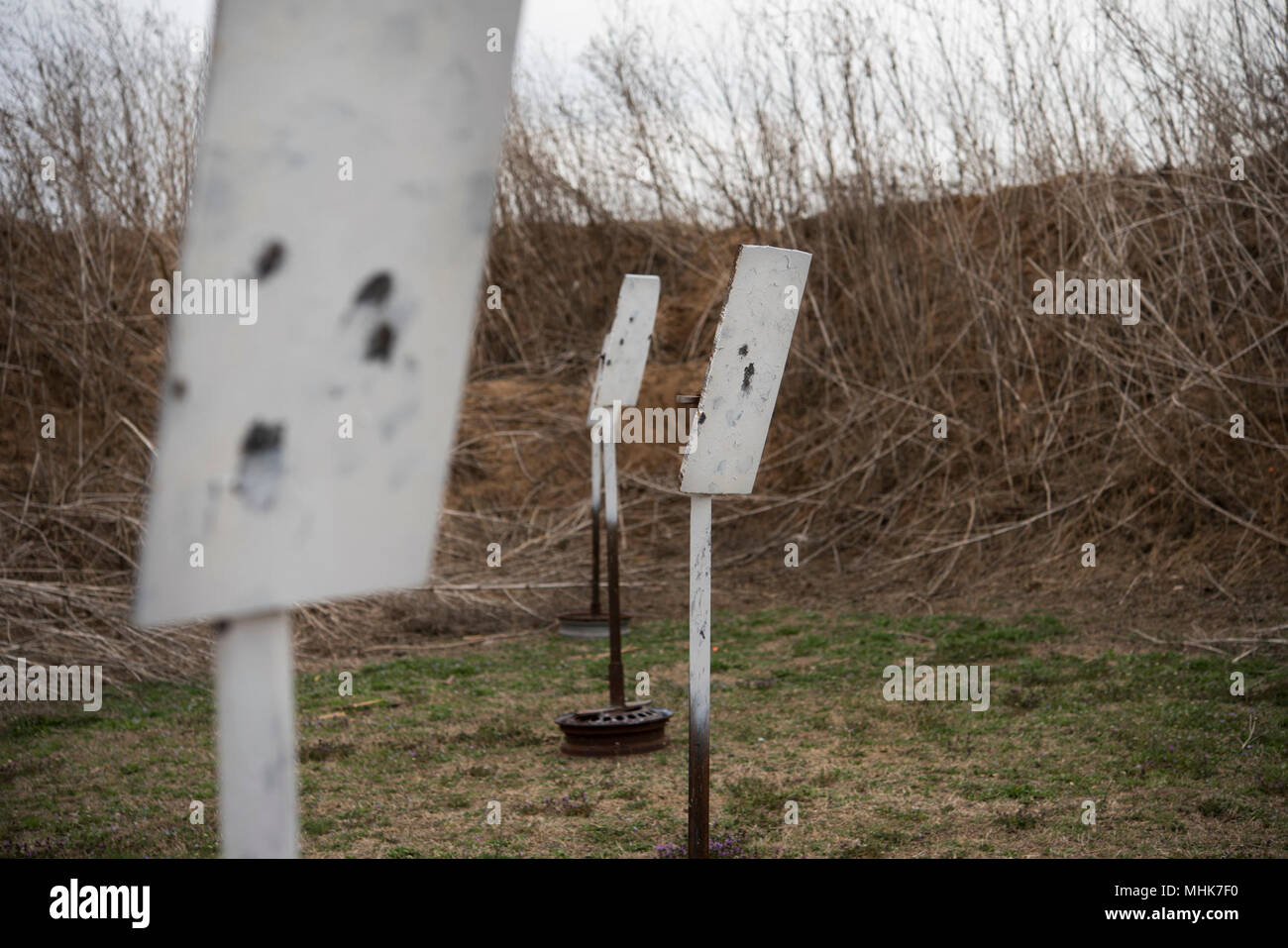 The Vance Chisholm Trail Shooters club used steel targets for a Steel Challenge competition, March 23, 2018, at the Practical Pistol Shooting Range. The Vance Chisholm Trail Shooters club is an organization run by members of Vance Air Force Base to increase comradery and proficiency among military shooters. (U.S. Air Force Stock Photo