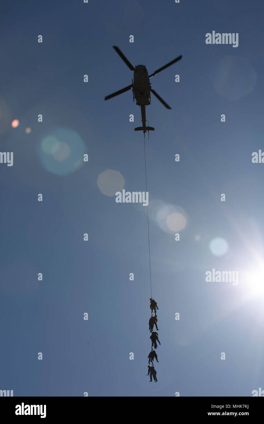 U.S. Marines with II Marine Expeditionary Force Information Group conduct special patrol insertion and extraction operations training at Camp Lejeune, N.C., March 23, 2018. The Marines conducted the training to improve operational capabilities and to recertify helicopter rope suspension techniques masters. (U.S. Marine Corps Stock Photo