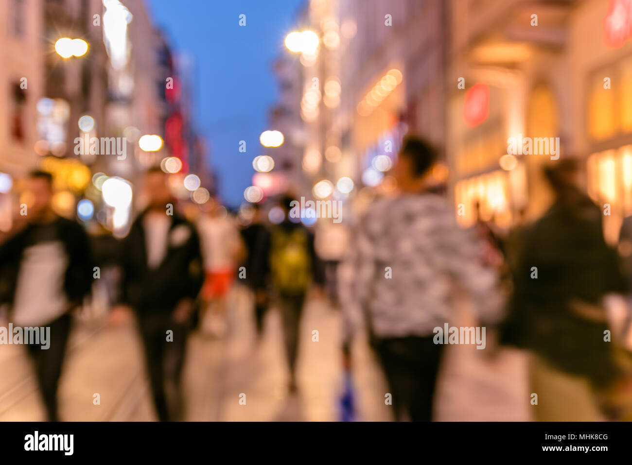 Person in focus in blurred crowd hi-res stock photography and images ...