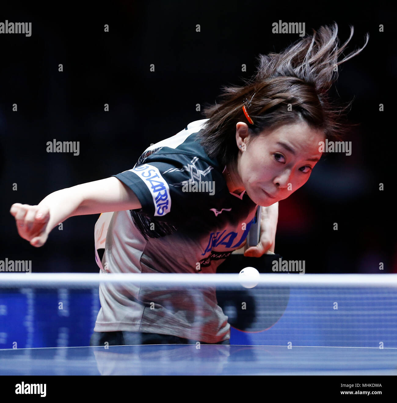 Halmstad, Sweden. 1st May, 2018. Kasumi Ishikawa of Japan serves to Wu Yue  of the United States during the Women's Group B fifth round match of 2018  World Team Table Tennis Championships