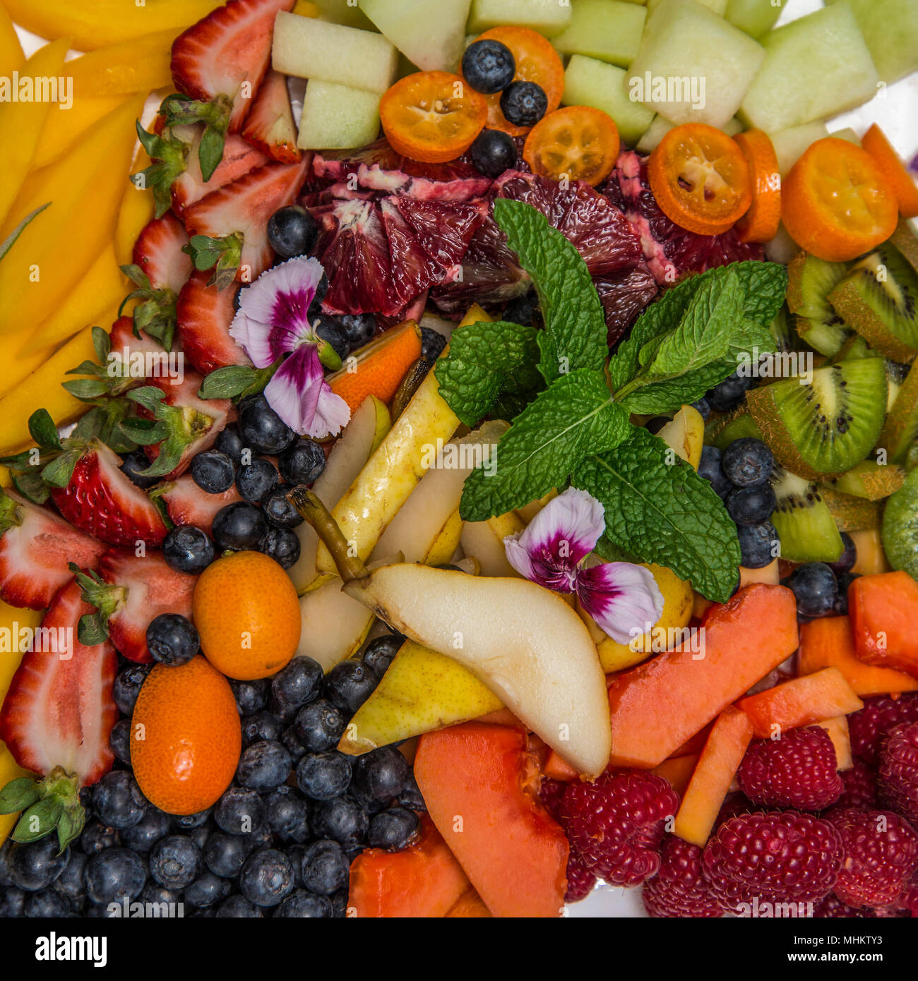 A beautiful platter of fresh colorful nutritious fruit including
