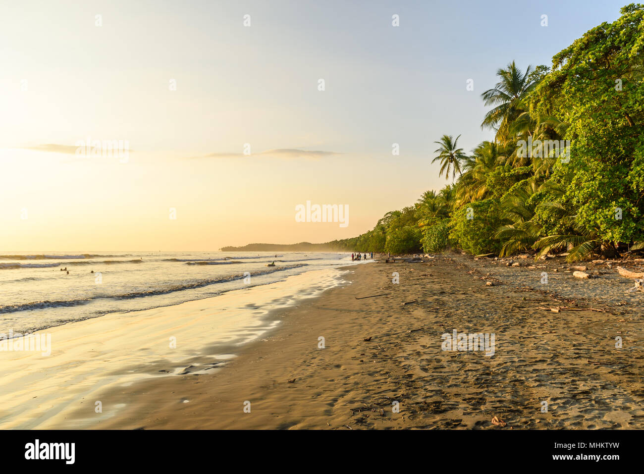 Sunset at paradise beach in Uvita, Costa Rica - beautiful beaches and tropical forest at pacific coast of Costa Rica - travel destination in central a Stock Photo