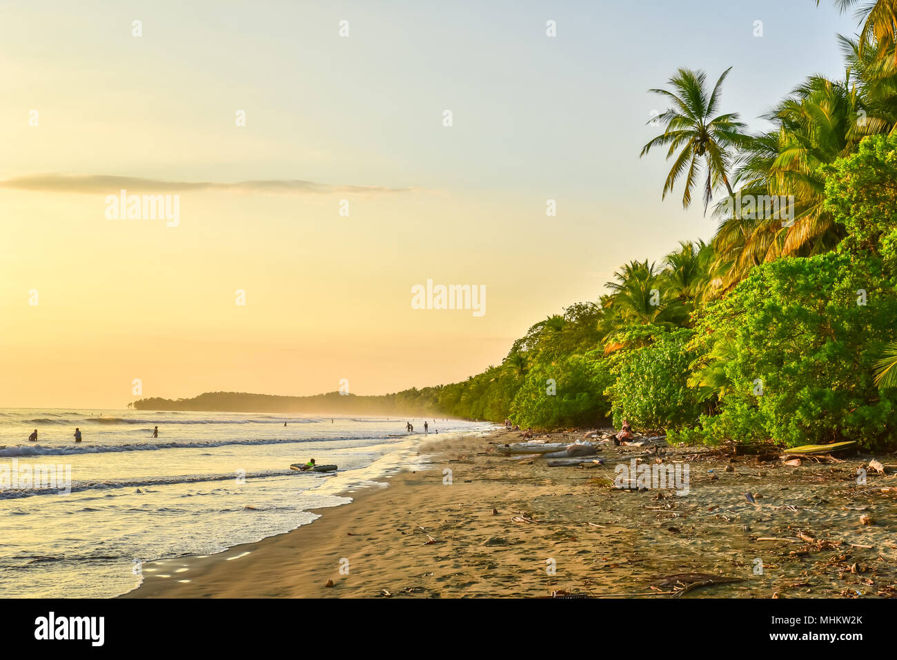 Sunset at paradise beach in Uvita, Costa Rica - beautiful beaches and tropical forest at pacific coast of Costa Rica - travel destination in central a Stock Photo