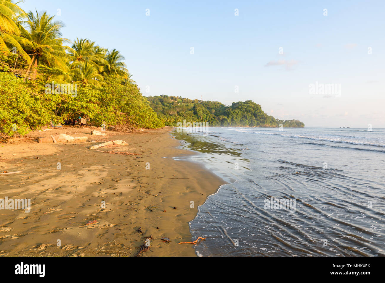 Sunset at paradise beach in Uvita, Costa Rica - beautiful beaches and tropical forest at pacific coast of Costa Rica - travel destination in central a Stock Photo