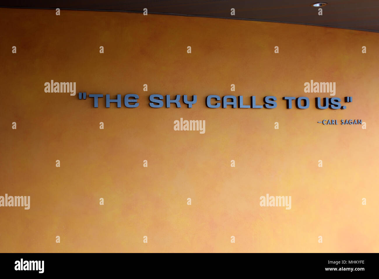 The sky calls to us. Carl Sagan. A title at the Kennedy Space center in Orlando. Stock Photo