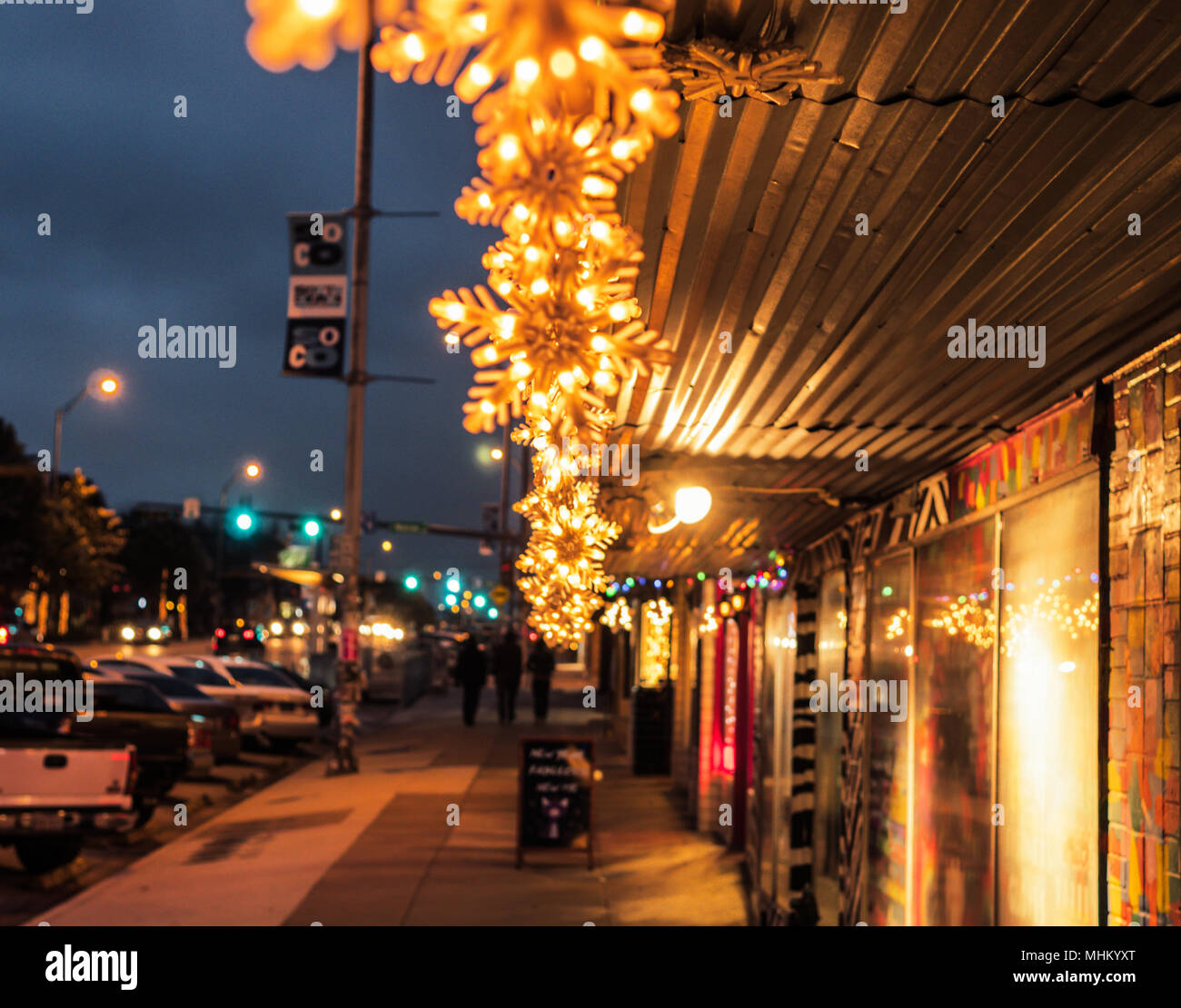 AUSTIN, TEXAS - DECEMBER 31, 2017: Holiday snowflake decorations light up a building along Congress Ave. Stock Photo
