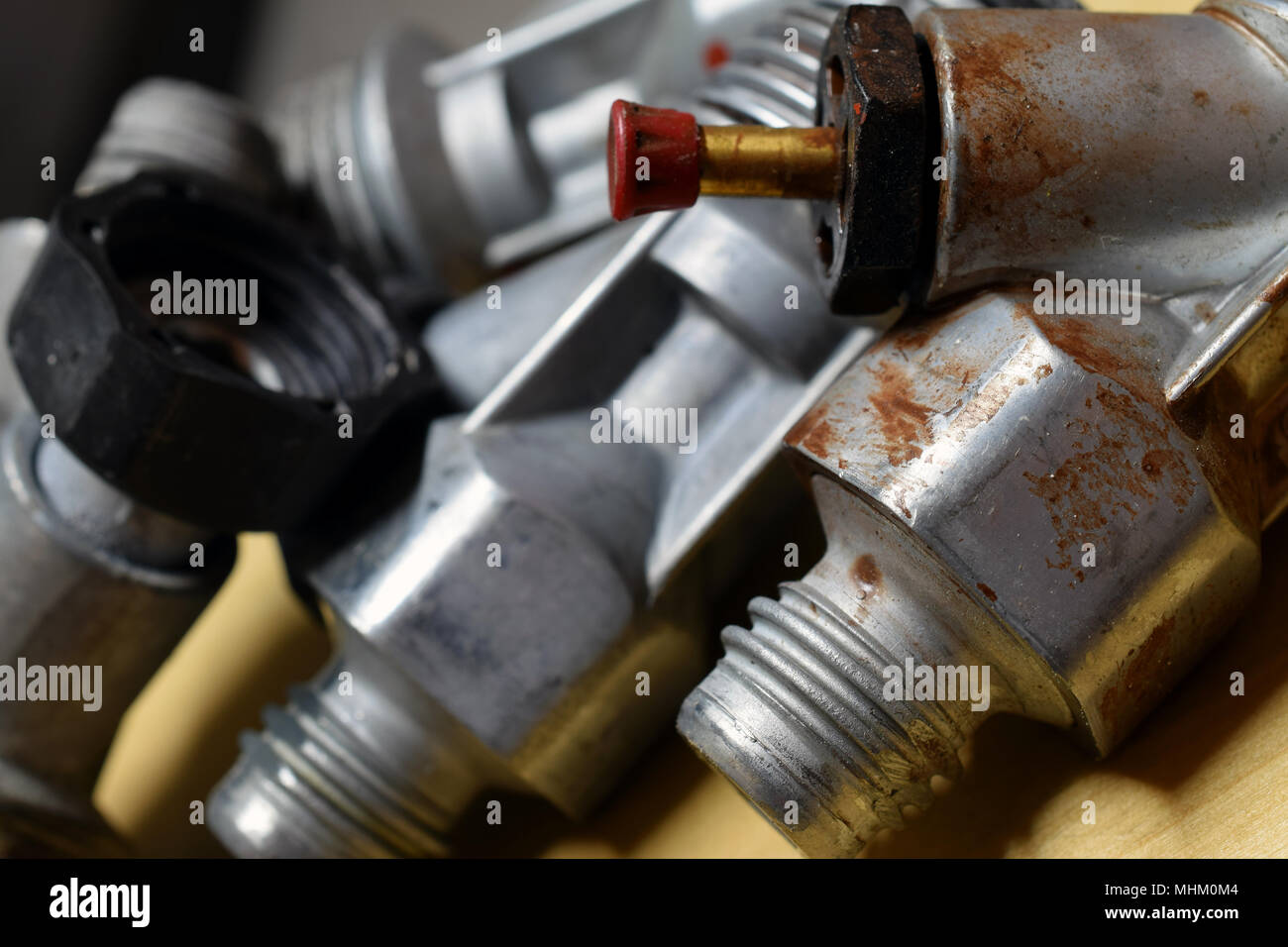 Used valves of airless paint sprayer close up Stock Photo Alamy