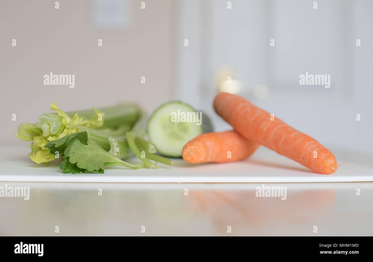 Celery cucumber and carrots healthy snack Stock Photo Alamy